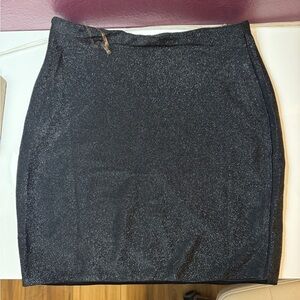 Mini skirt, stretchy material. No tags. Never used.